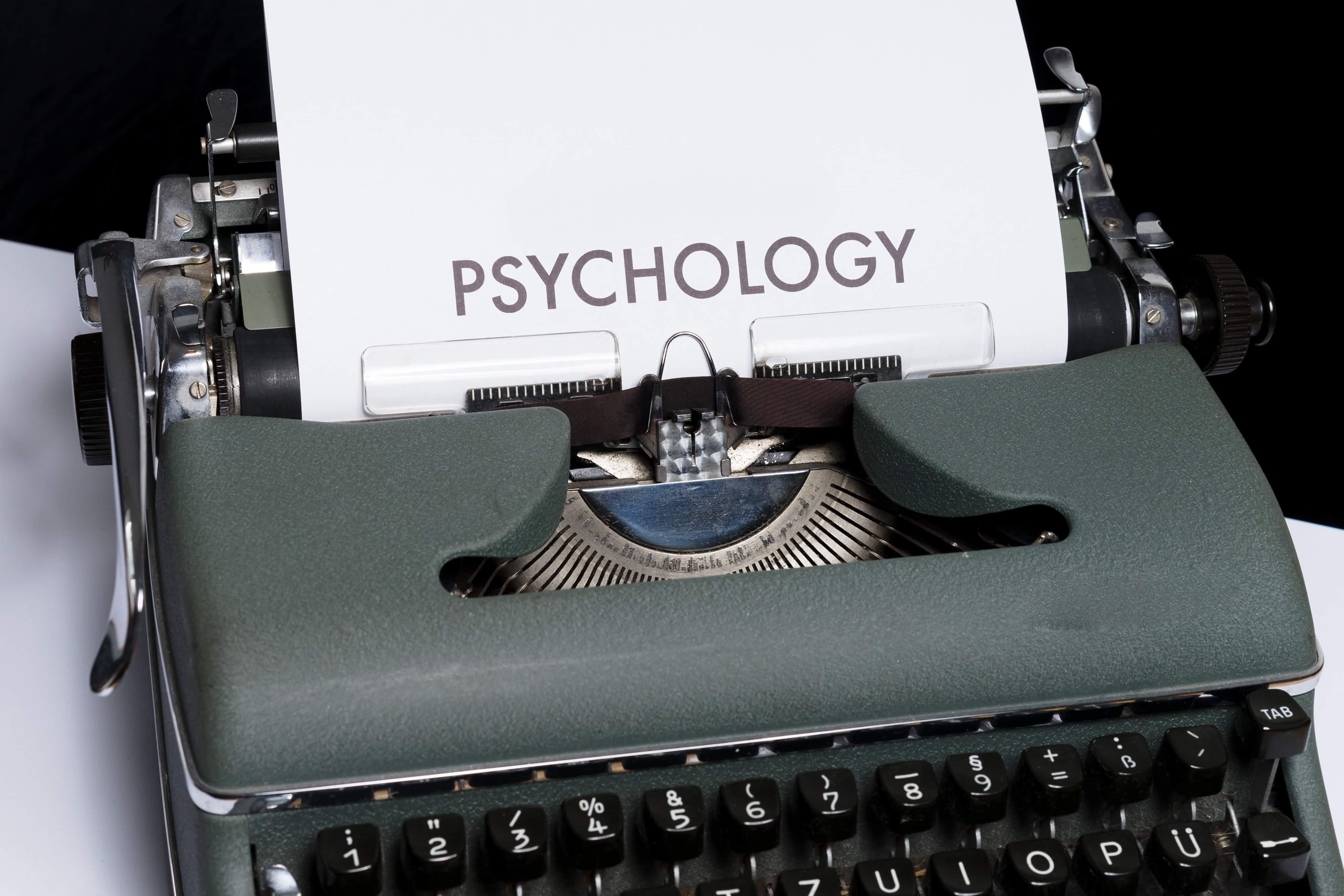 typewriter-with-paper-saying-psychology